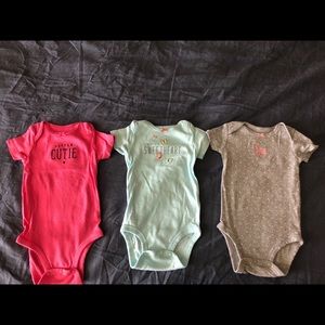 3 Onesies with affirming messages